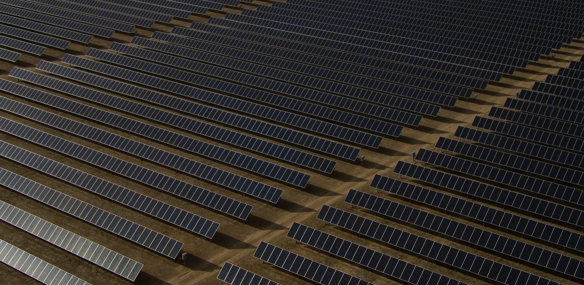 Rows of solar panels seen from above