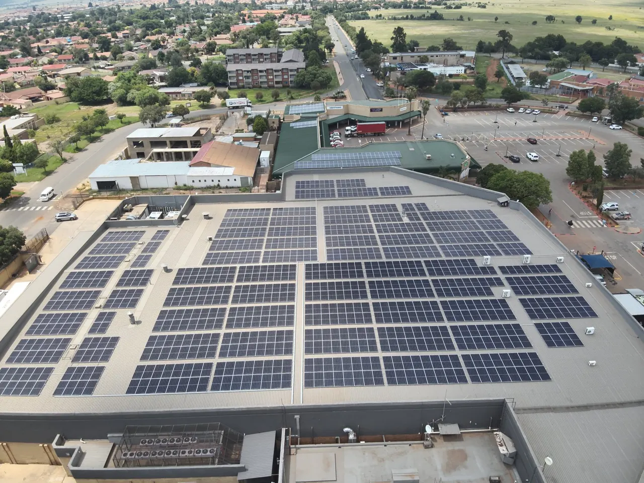 Aerial view of about 728 kWp of rooftop solar on a shopping centre in Westonaria, Gauteng